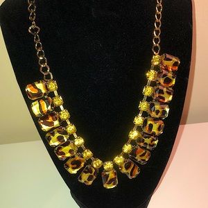 Beautiful goldtone necklace with Gold rhinestones & leopard print Cabochons